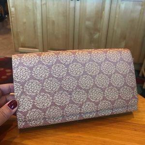 Vintage button closure clutch